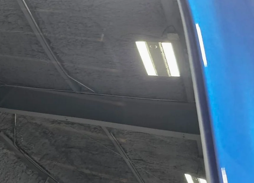The same glass after multi-stage polishing, reflecting cleanly