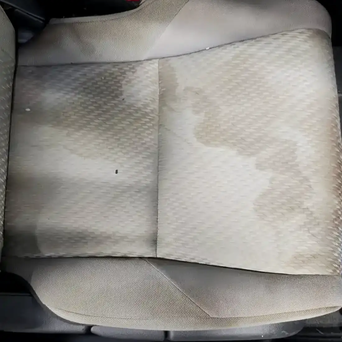 The same cloth seat cleaned and extracted
