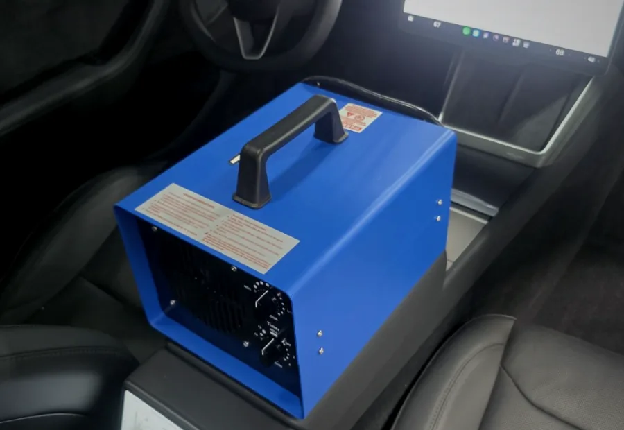 An odor treatment machine running inside a vehicle
